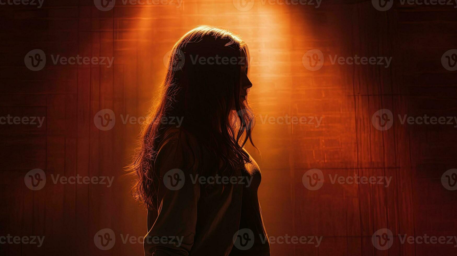 Silhouette of a girl in front of a light photo