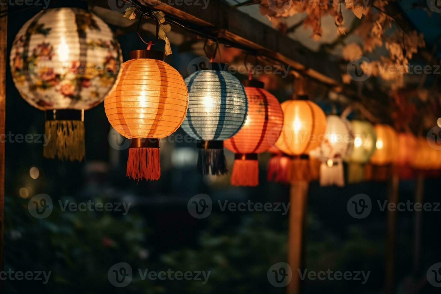 colorful paper lanterns hanging from a wooden structure photo