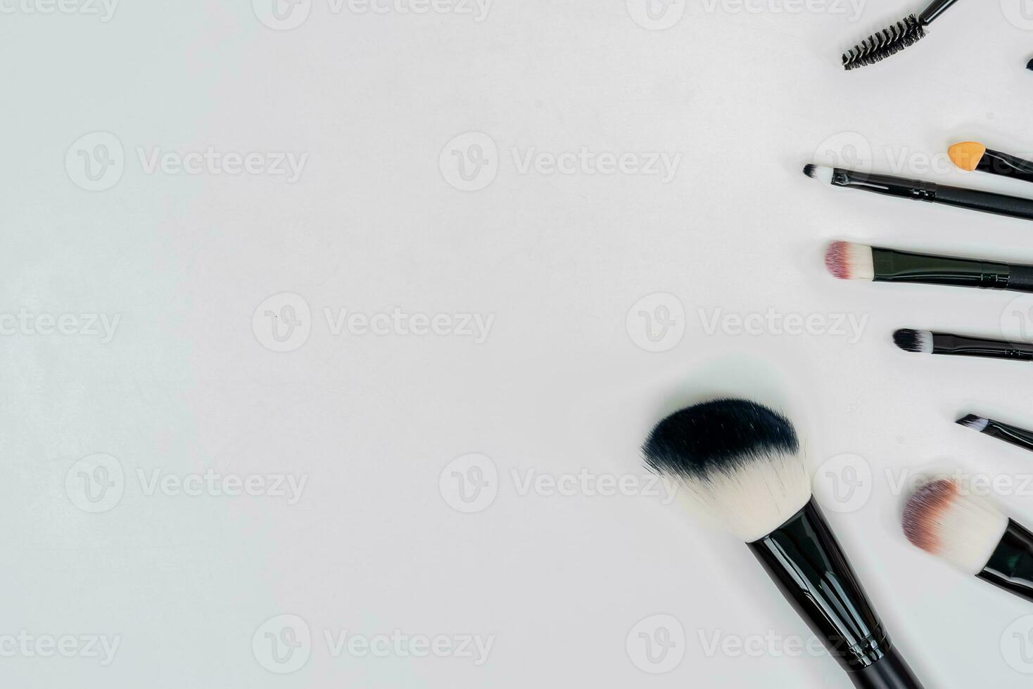 top view of makeup cosmetics set professional makeup tools. on a White background photo