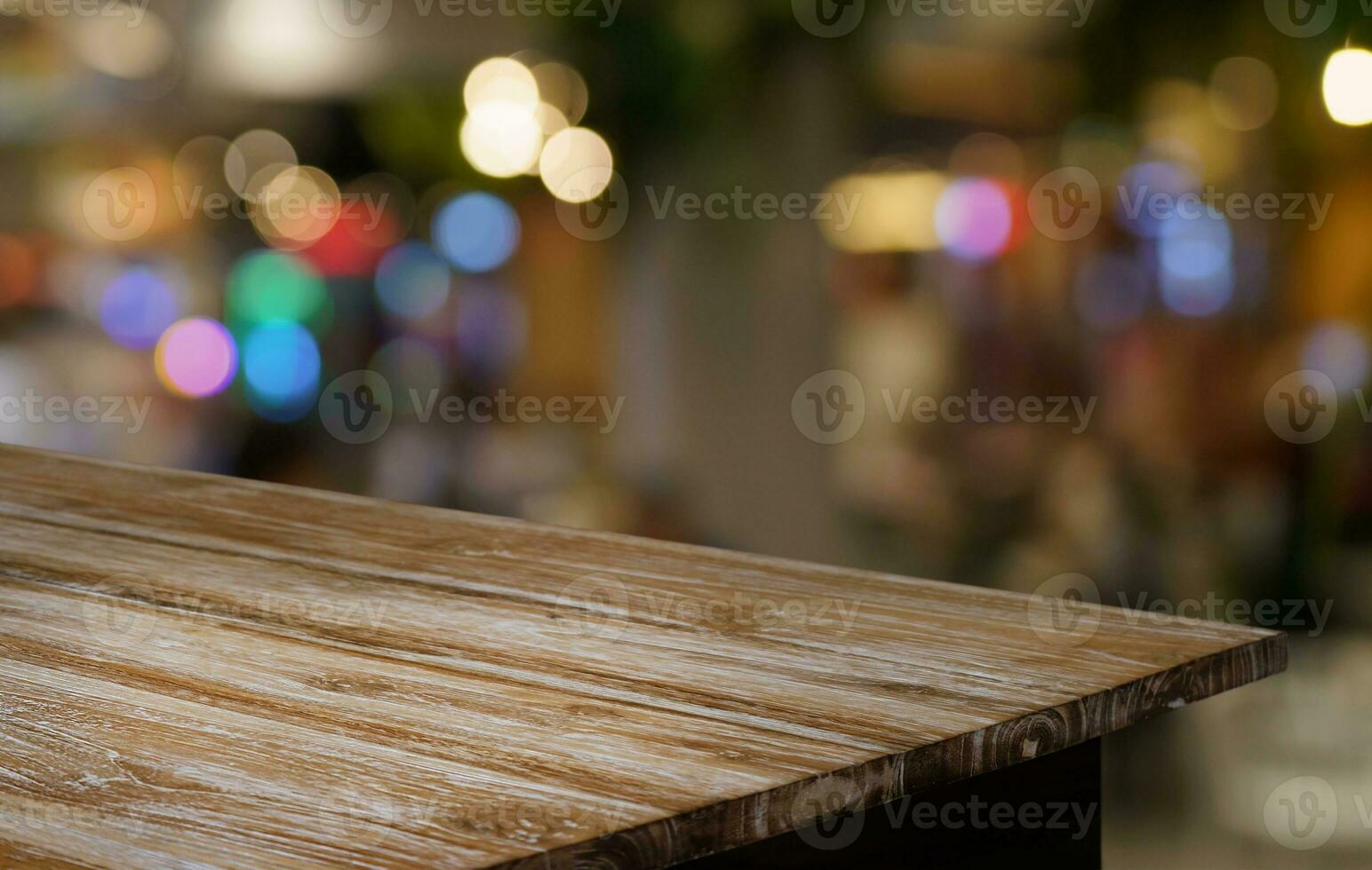 Empty wood table top and blur of out door garden background Empty wooden table space for text marketing promotion. blank wood table copy space for background photo