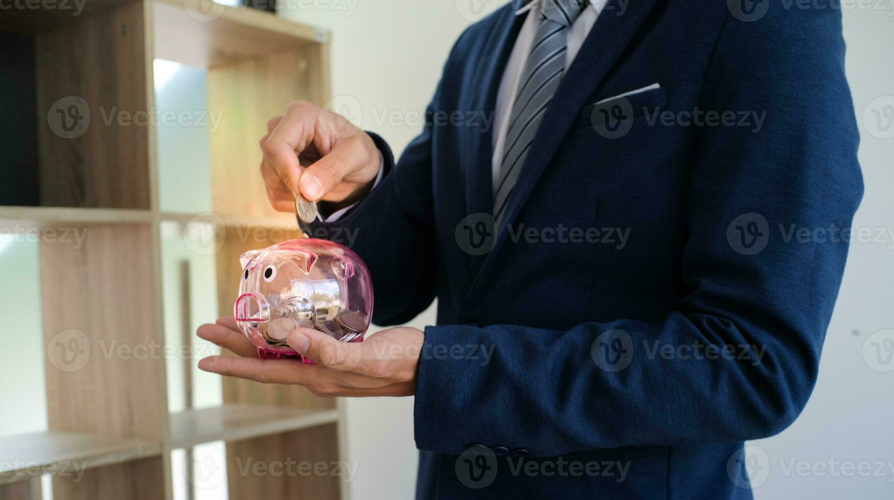 Saving money. Businessman Accountant verify growing business and saving money stacking coins with calculator. Accountancy Concept. photo