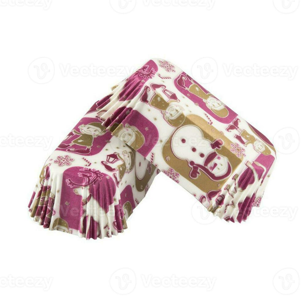 White paper baking forms for cakes with New Year background pattern photo