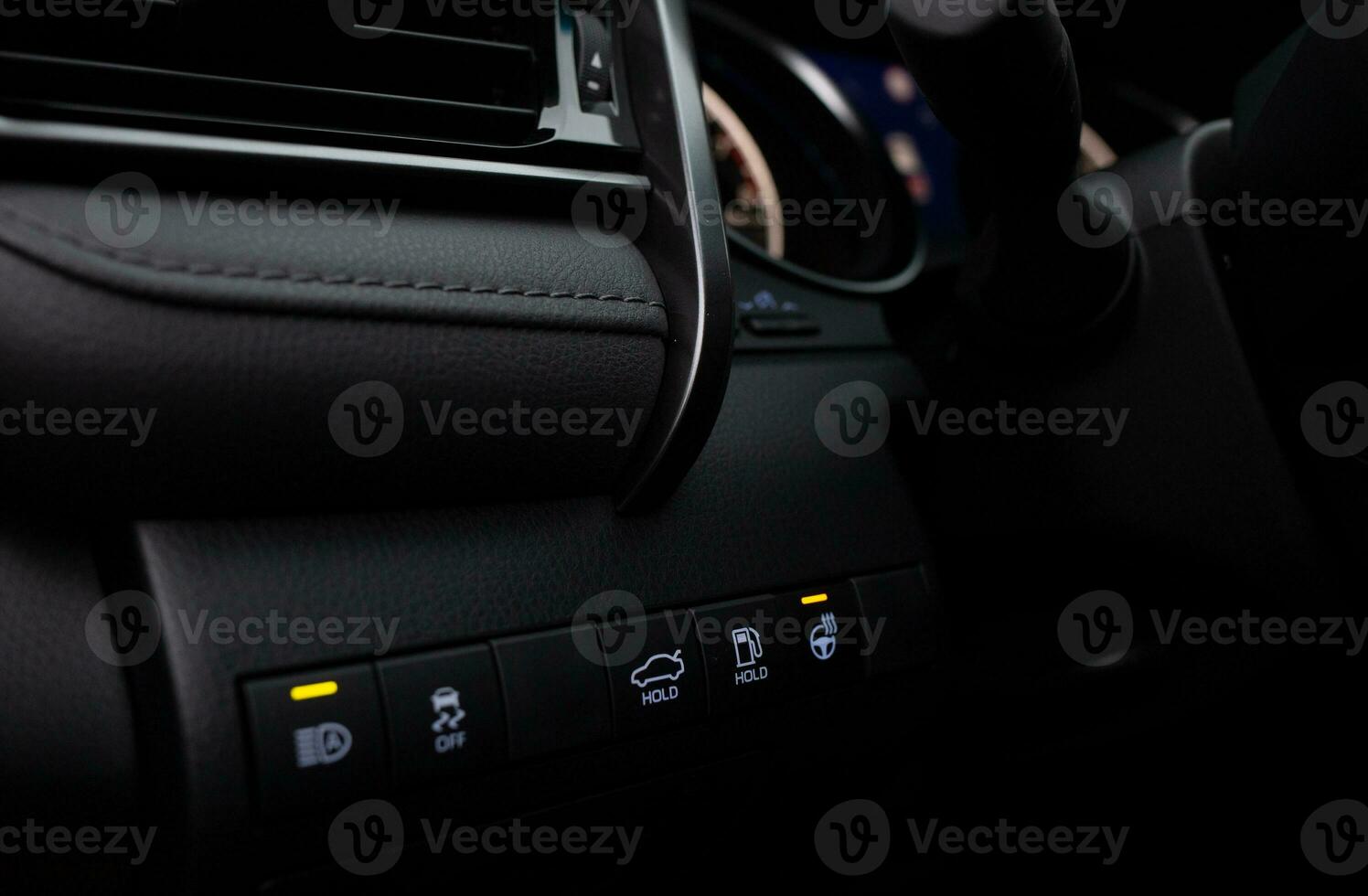 Car buttons on a control panel background, car elements close view photo