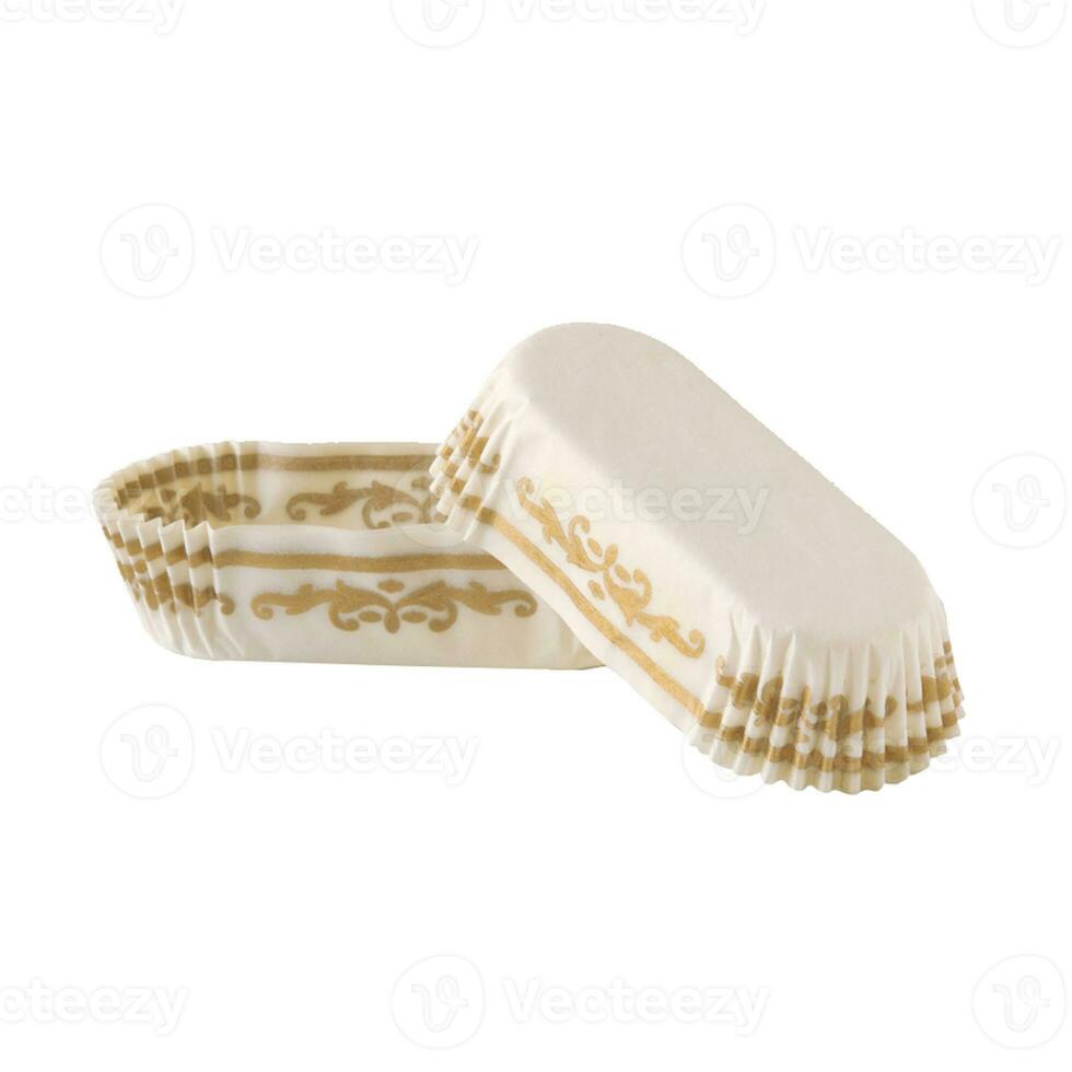 White paper baking form for eclairs and cakes with golden pattern photo
