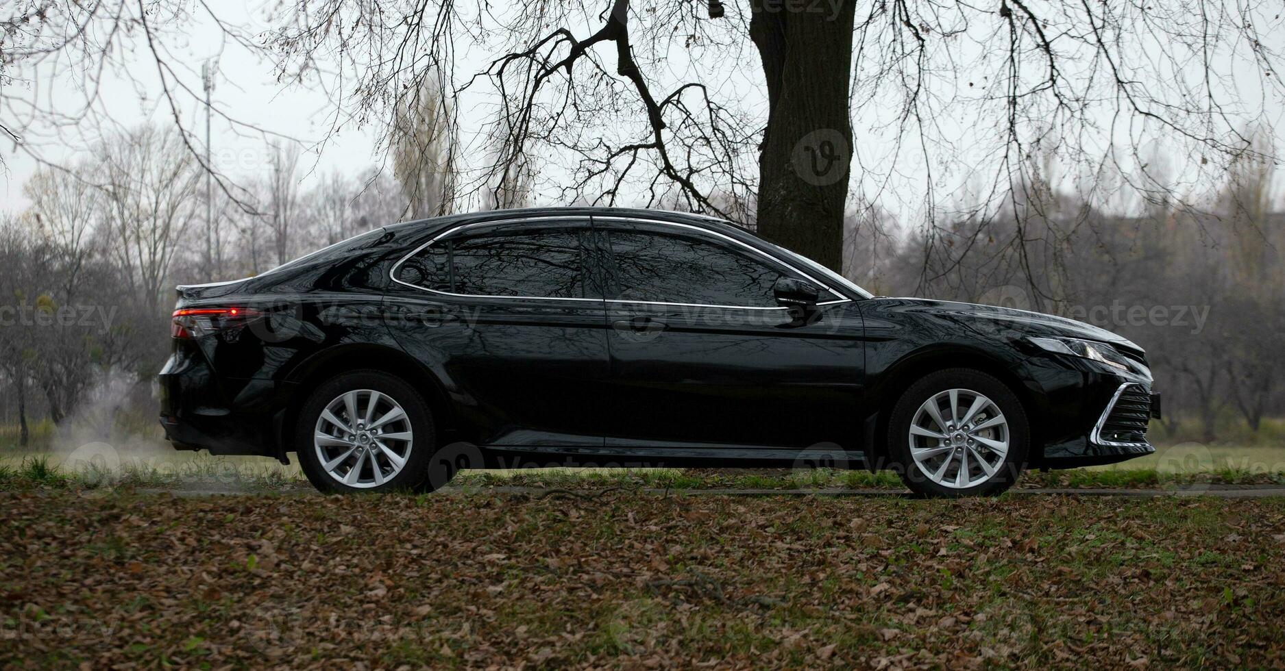 Modern car moving at the country side background photo