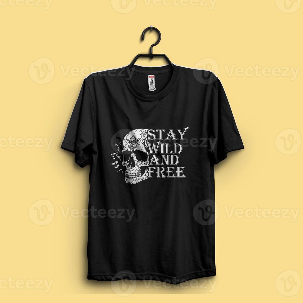 Stay wild and free text skull design. Skull t shirt design. Western rodeo cowboy photo