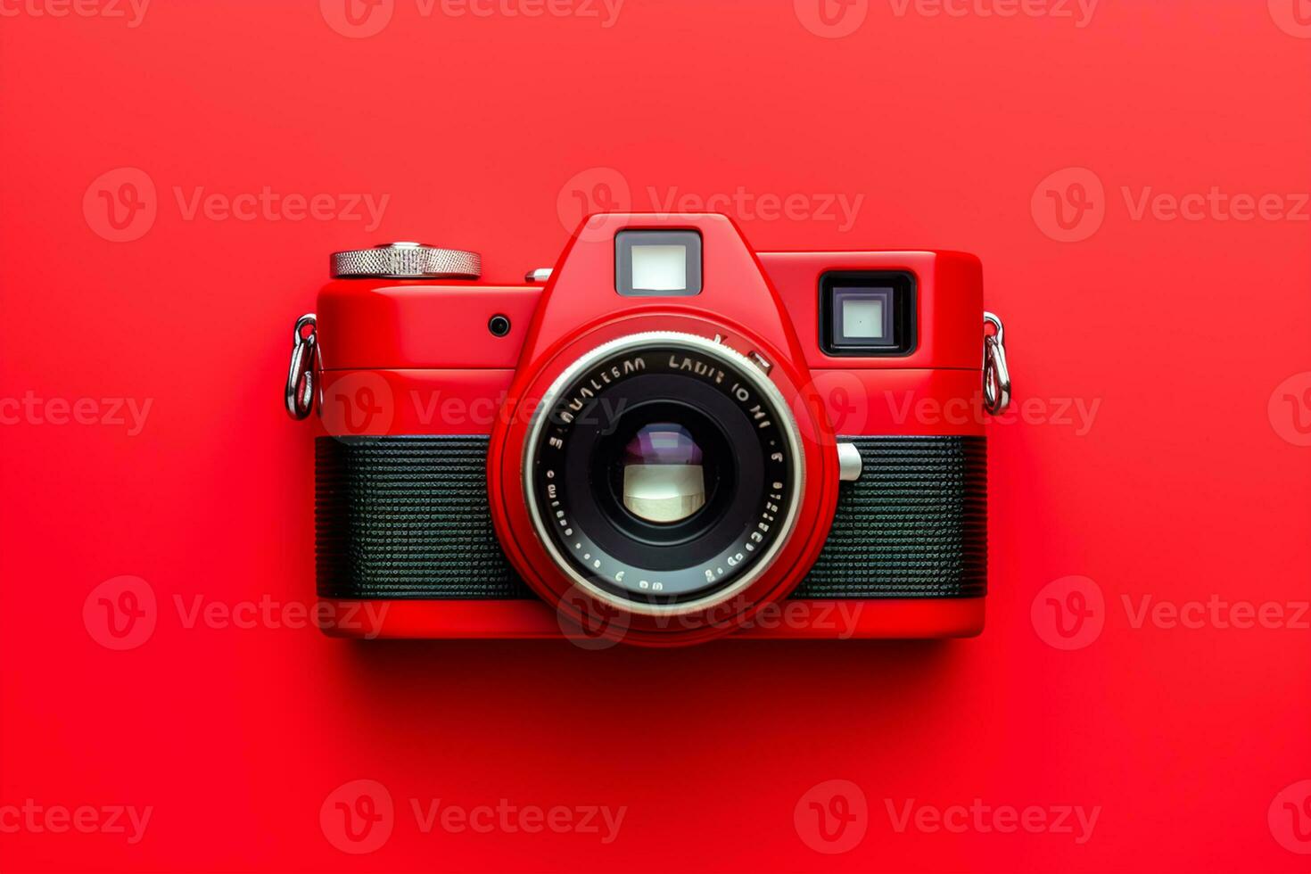 Retro camera isolated on red background. Flat lay, top view photo