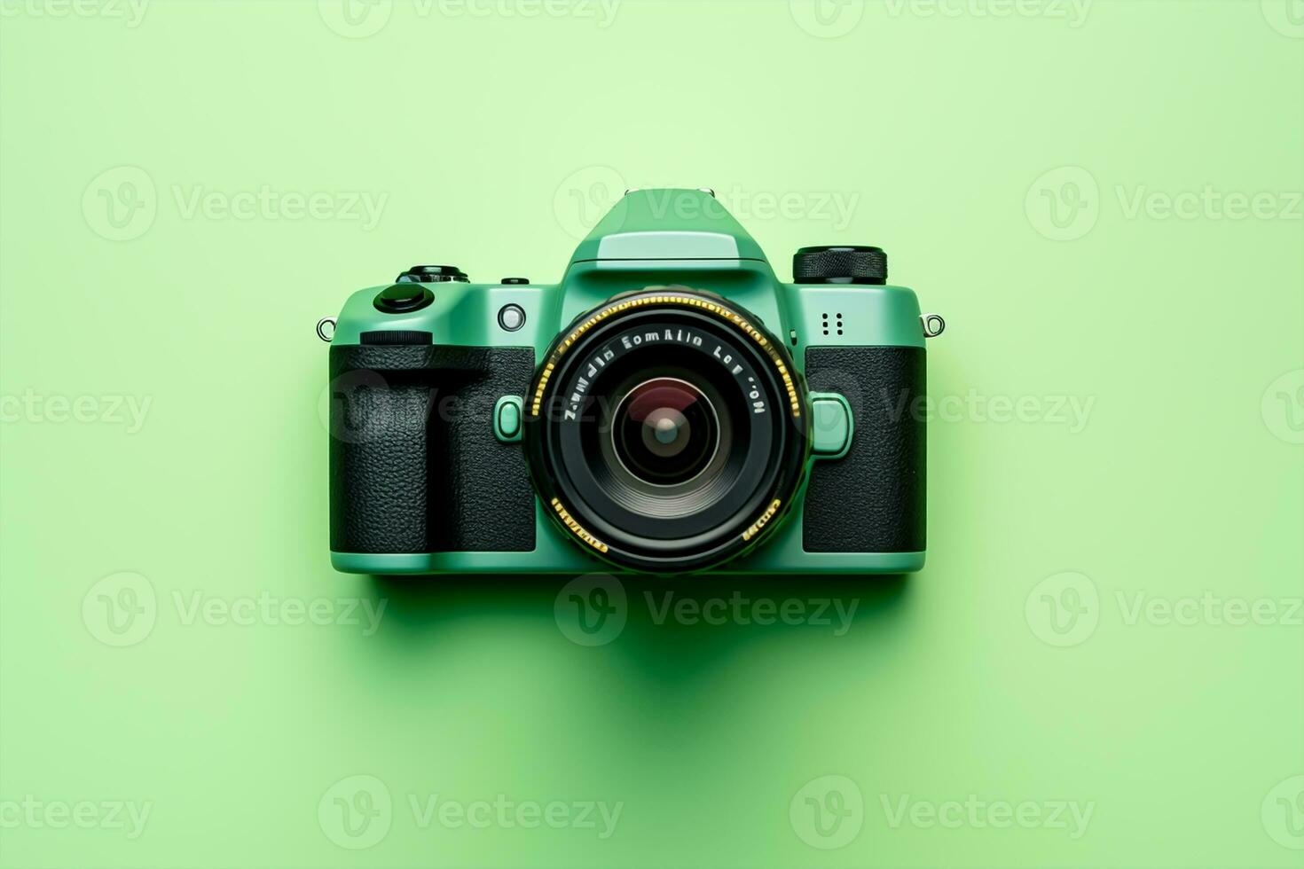 Retro camera on a green background, top view, flat lay photo