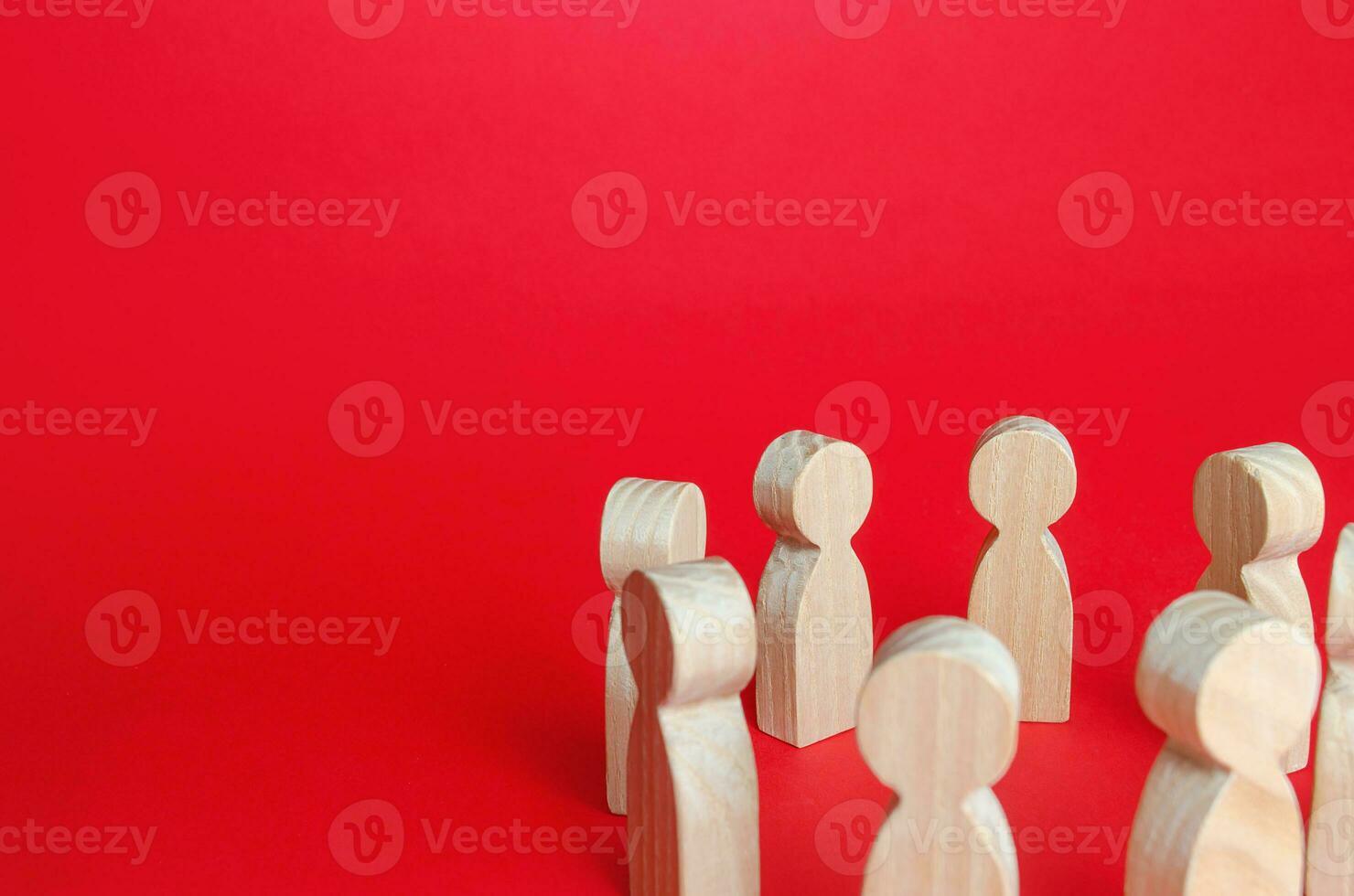 Figures of people in a circle. Social gathering concept. Discussion of problems, development of solutions to conflicts through dialogue. Negotiations, reaching consensus. Cooperation and collaboration photo