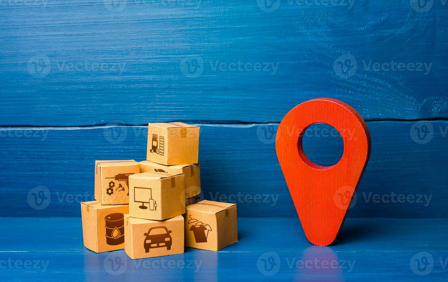 Red location pointer symbol and cardboard boxes. Transport logistics distribution delivery of goods to consumer customer. Adjusting the business to the new quarantine rules. Online sales growth photo