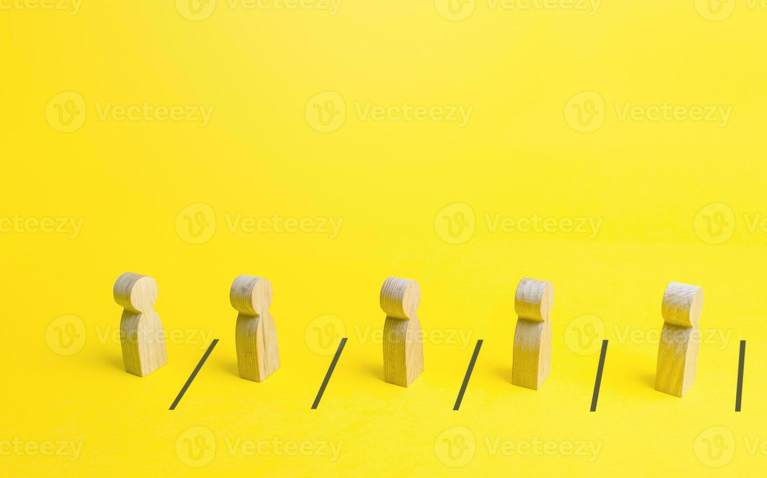 Figures of people stand in queue behind lines keeping a social distance. Discipline of compliance with epidemic quarantine measures. New normal. Safety measures. Avoiding spread of the virus. photo