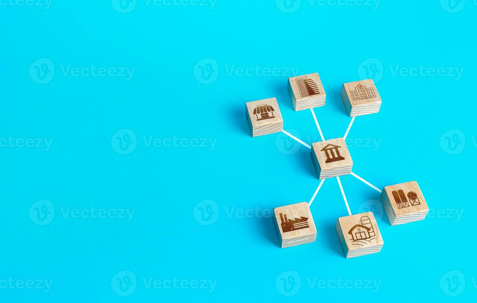 Block figurine bank is connected with institutions establishment and civil organizations. The functioning of the financial banking system. Lending and operating money transactions. Regulation economy photo