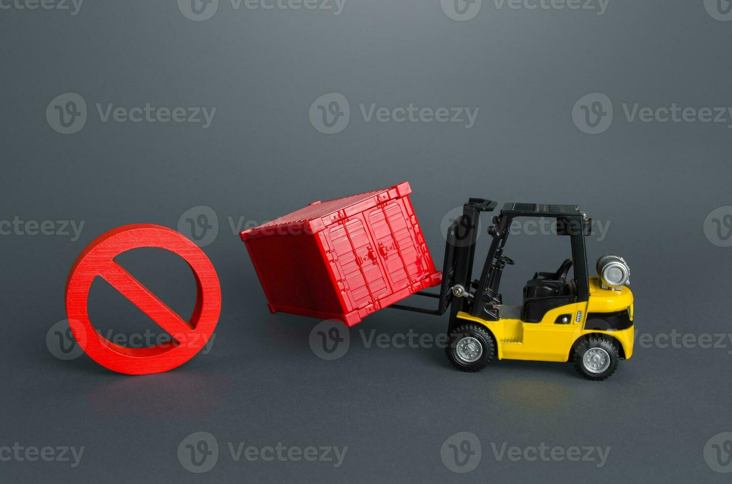 Forklift with container and prohibition symbol no. Sanctions economic pressure. Global crisis in container shipping, logistics problems. Shipping container shortage concept. Imbalance in global trade. photo