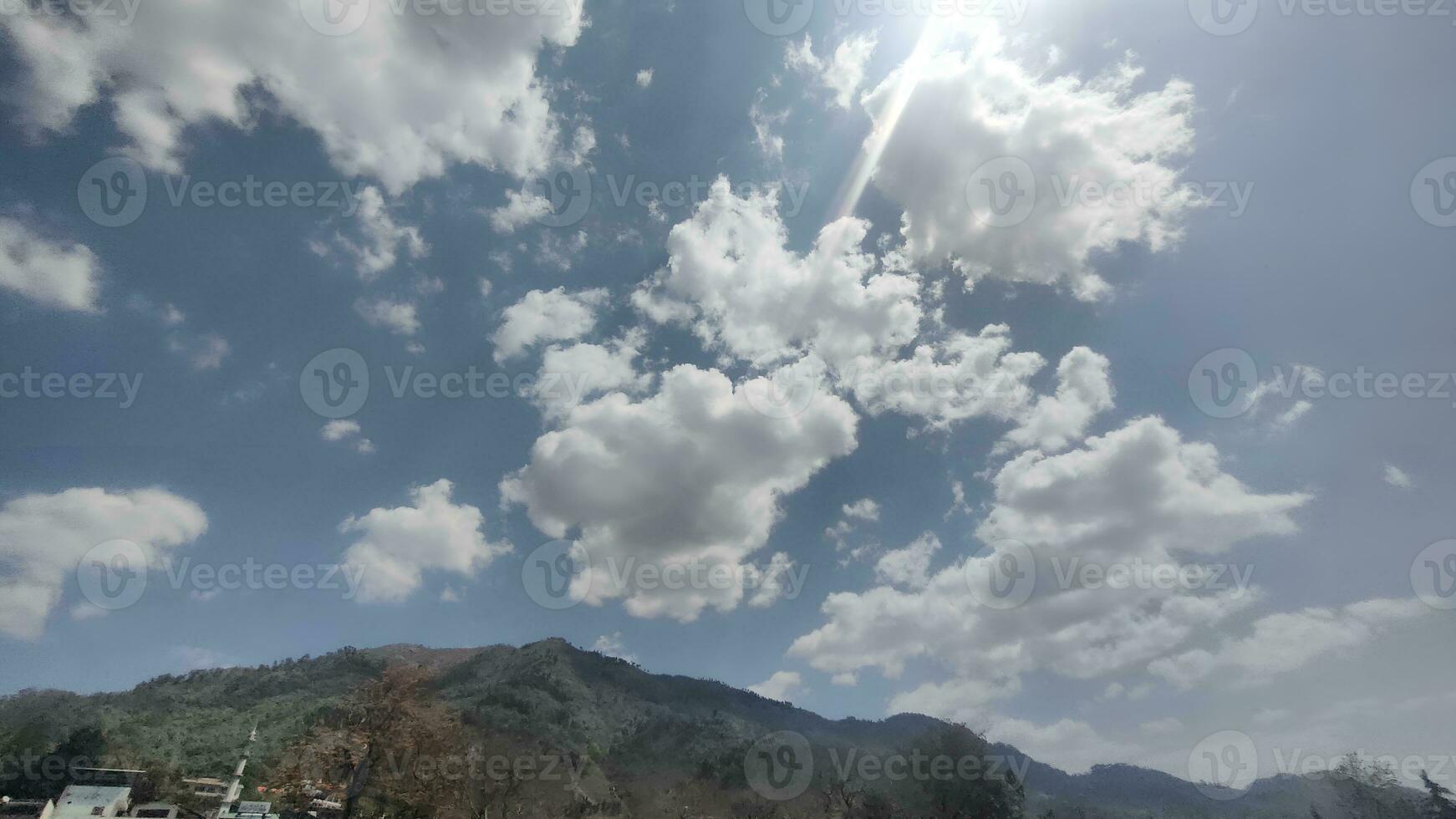 a view of the sky from a car window photo
