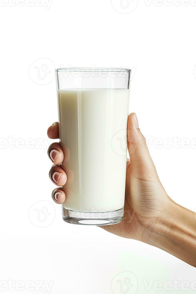 Hand holding a glass of fresh milk isolated on grey background. ai generated photo