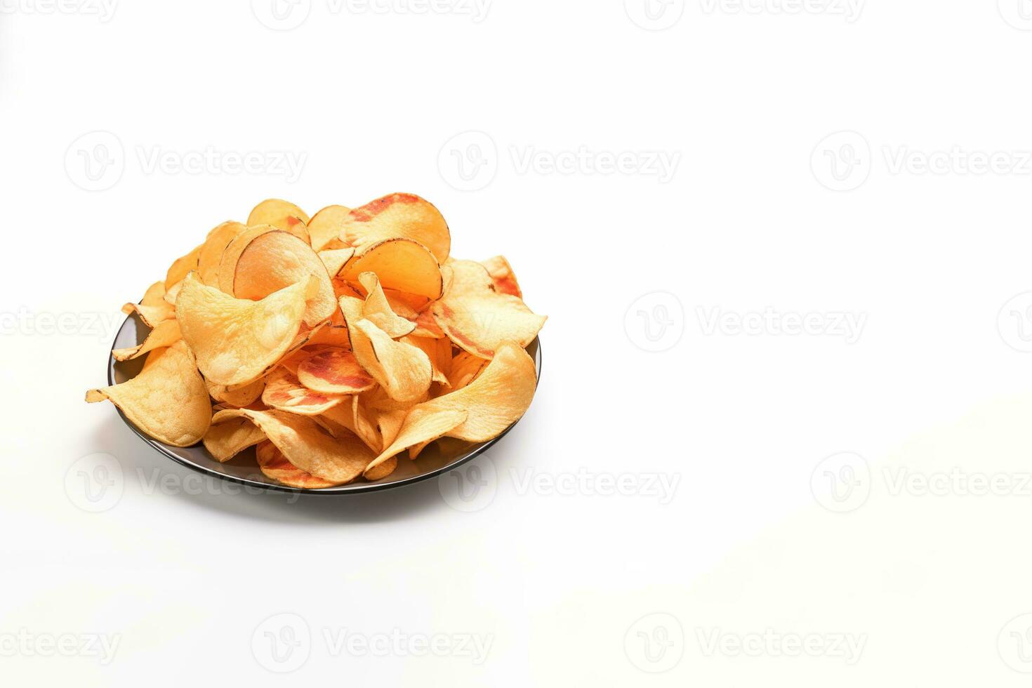 Crispy fried potato chips on a plate isolated on a white background with copy space. ai generated photo