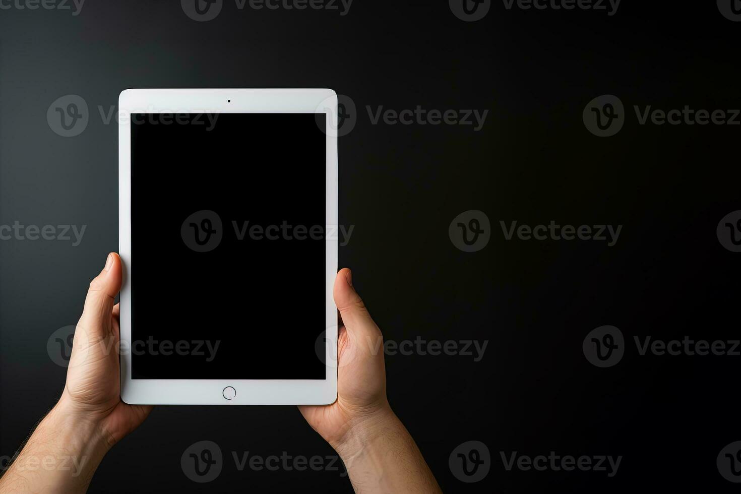 Hand holding tablet with mockup blank screen isolated on black background with copy space. ai generated photo