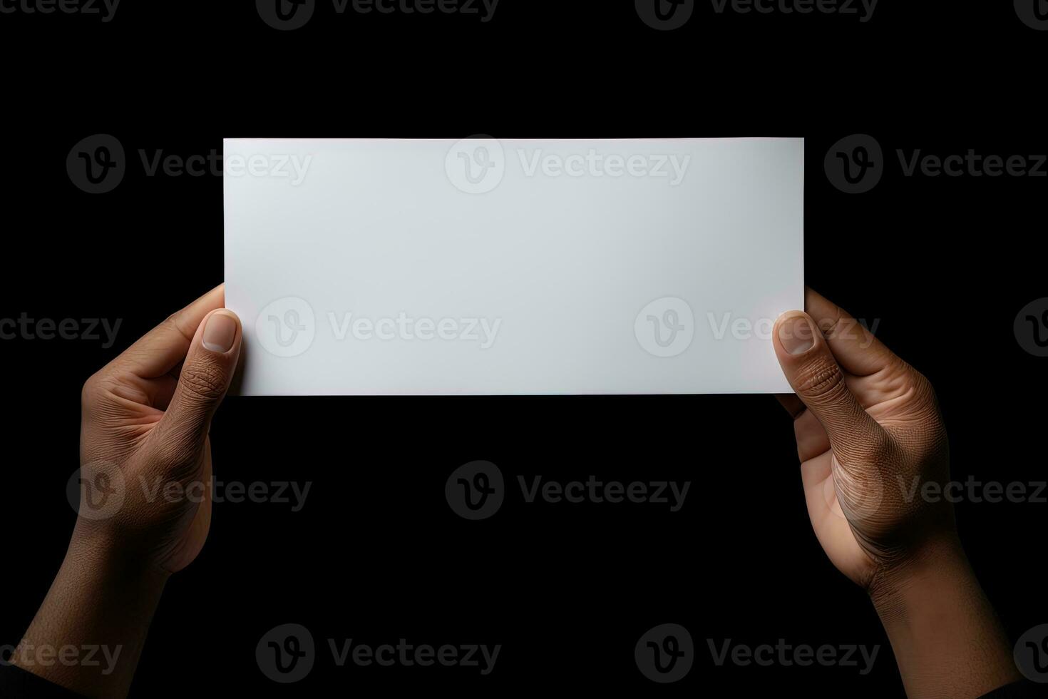 A human hand holding a blank sheet of white paper or card isolated on black background. ai generated photo
