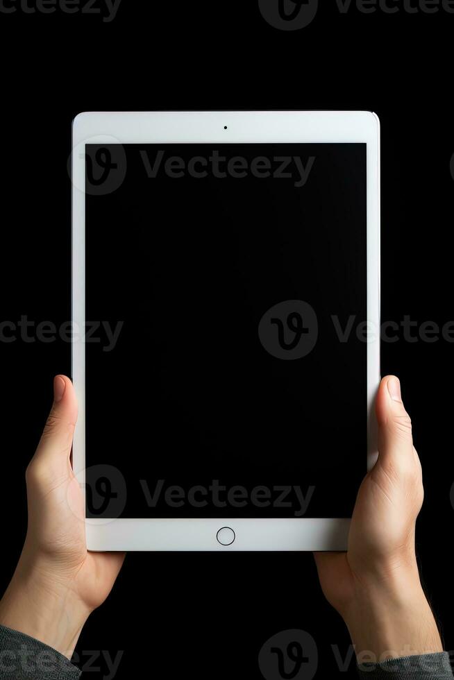 Hand holding tablet with mockup blank screen isolated on black background. ai generated photo