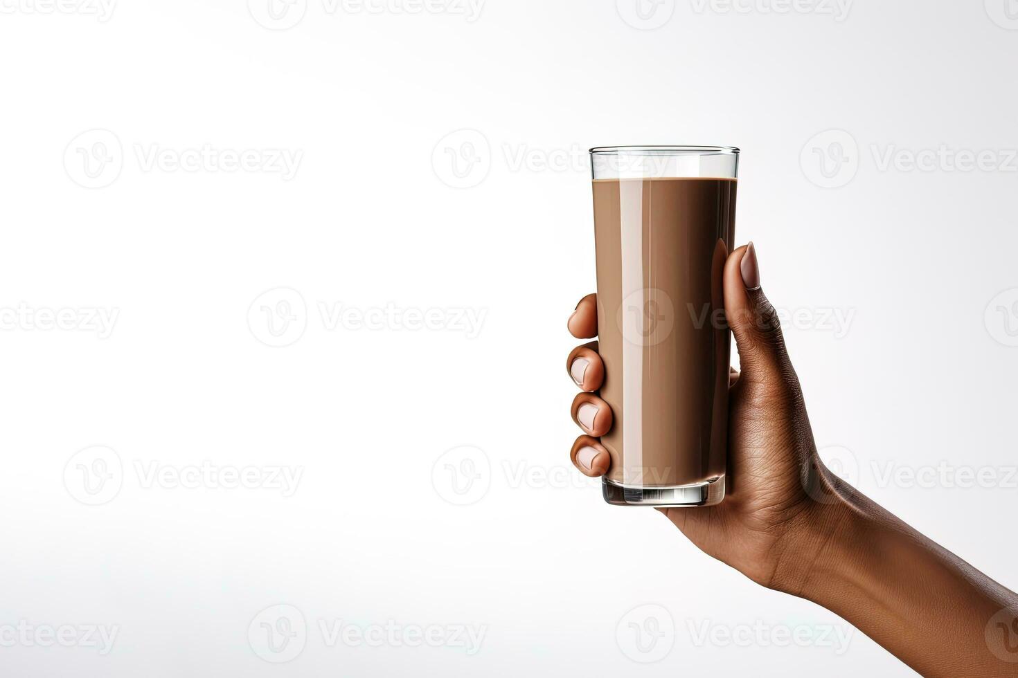 Hand holding a glass of delicious chocolate milk isolated on white background with copy space. ai generated photo