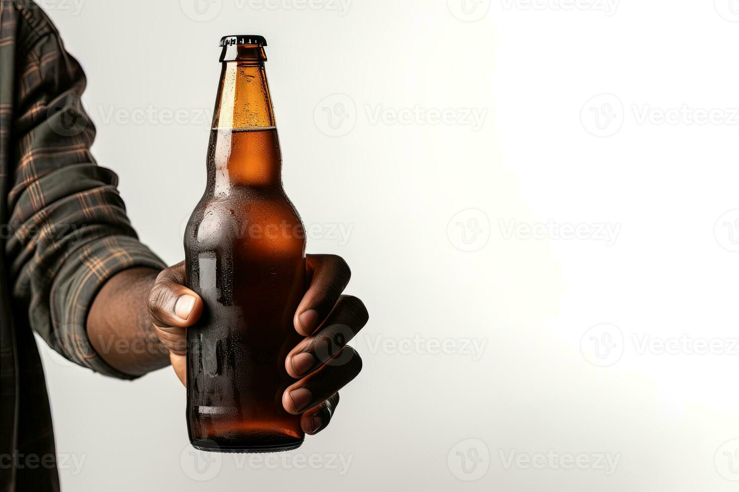 a male hand holding up a bottle of beer isolated on a white background with copy space. ai generated photo