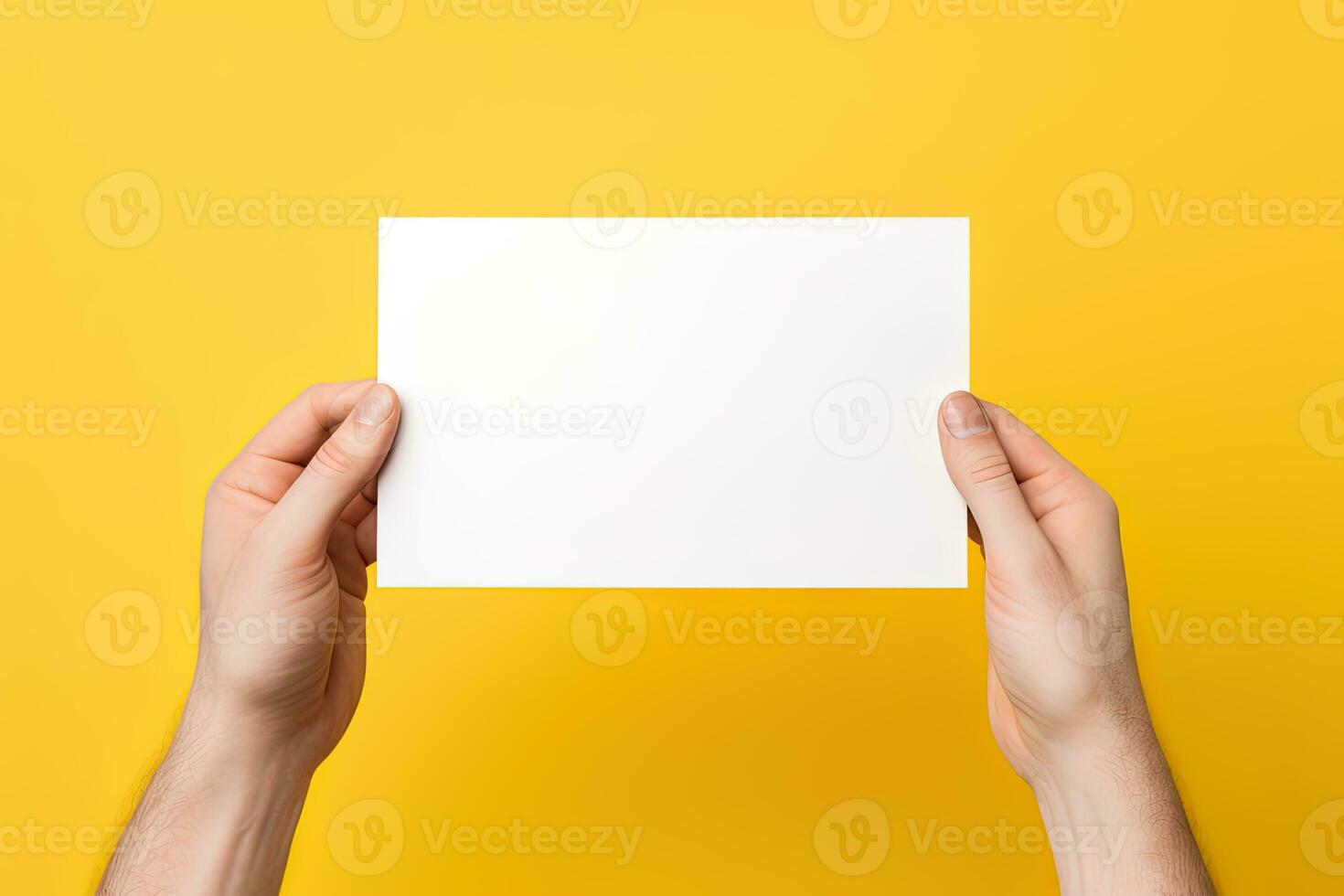 A human hand holding a blank sheet of white paper or card isolated on yellow background. ai generated photo