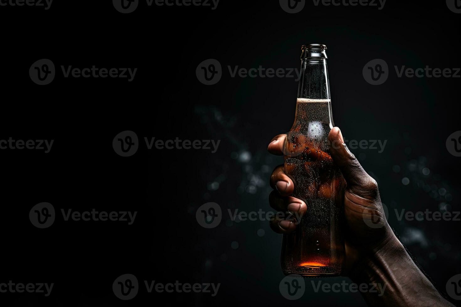 a male hand holding up a bottle of beer isolated on a black background with copy space. ai generated photo