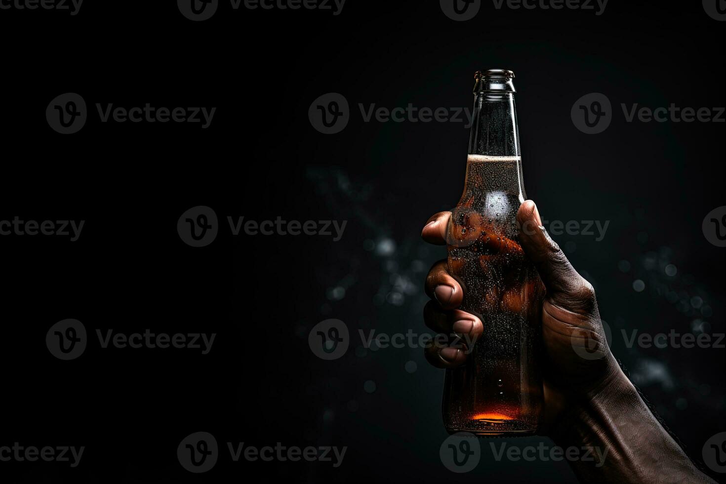 a male hand holding up a bottle of beer isolated on a black background with copy space. ai generated photo