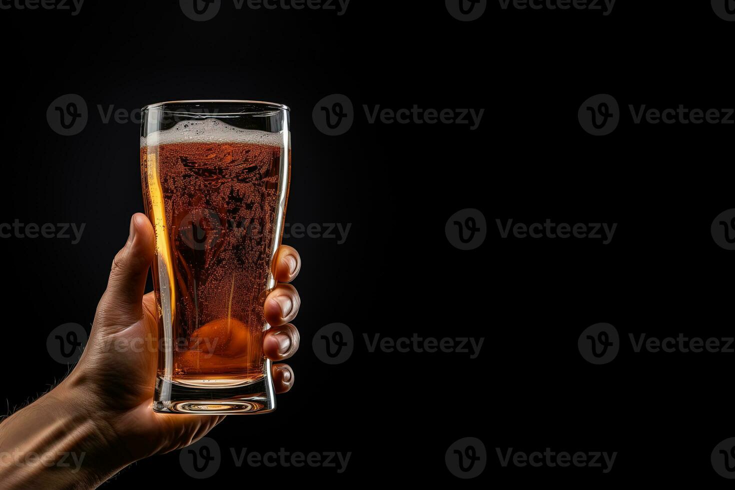 a male hand holding up a glass of beer isolated on a black background with copy space. ai generated photo