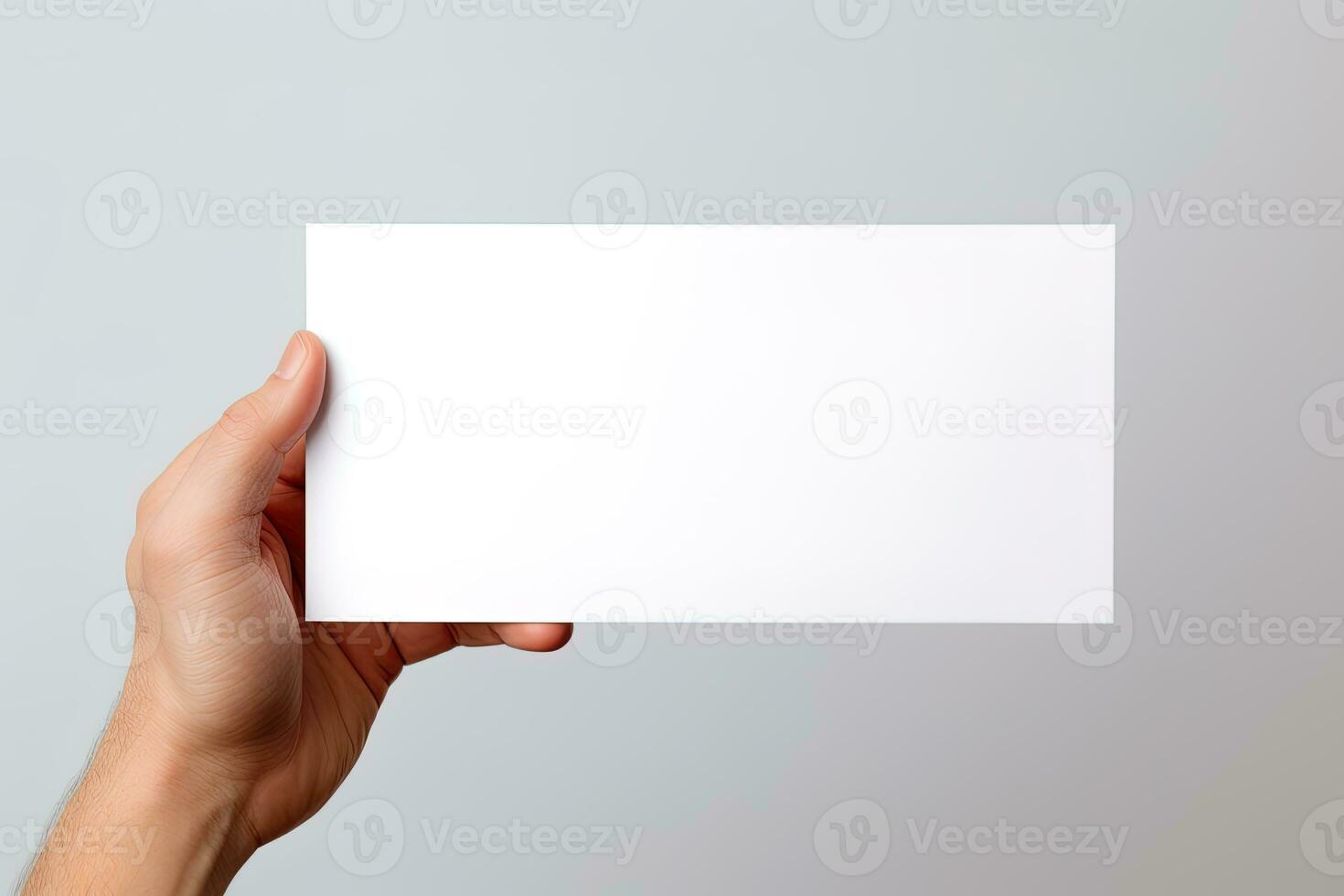 A human hand holding a blank sheet of white paper or card isolated on white background. ai generated photo