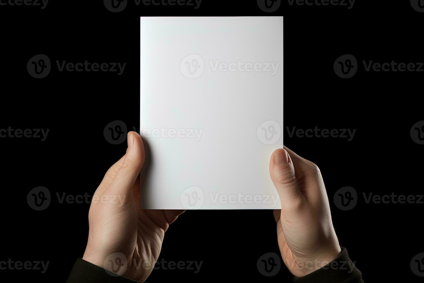 A human hand holding a blank sheet of white paper or card isolated on black background. ai generated photo