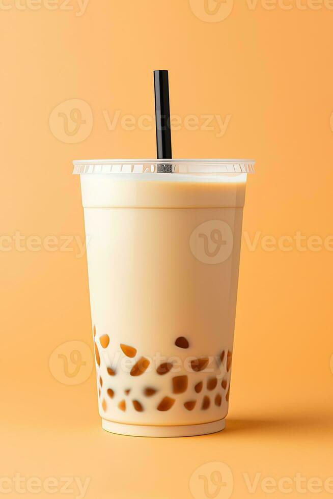 iced milk tea and bubble boba in the plastic glass on the beige background. ai generated photo