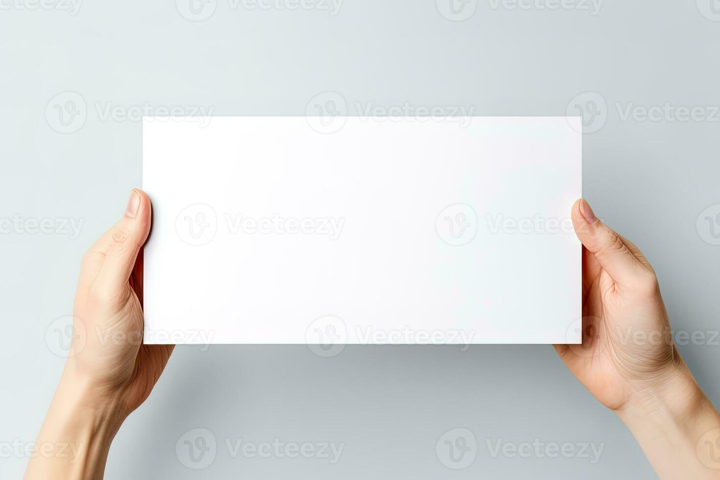 A human hand holding a blank sheet of white paper or card isolated on white background. ai generated photo