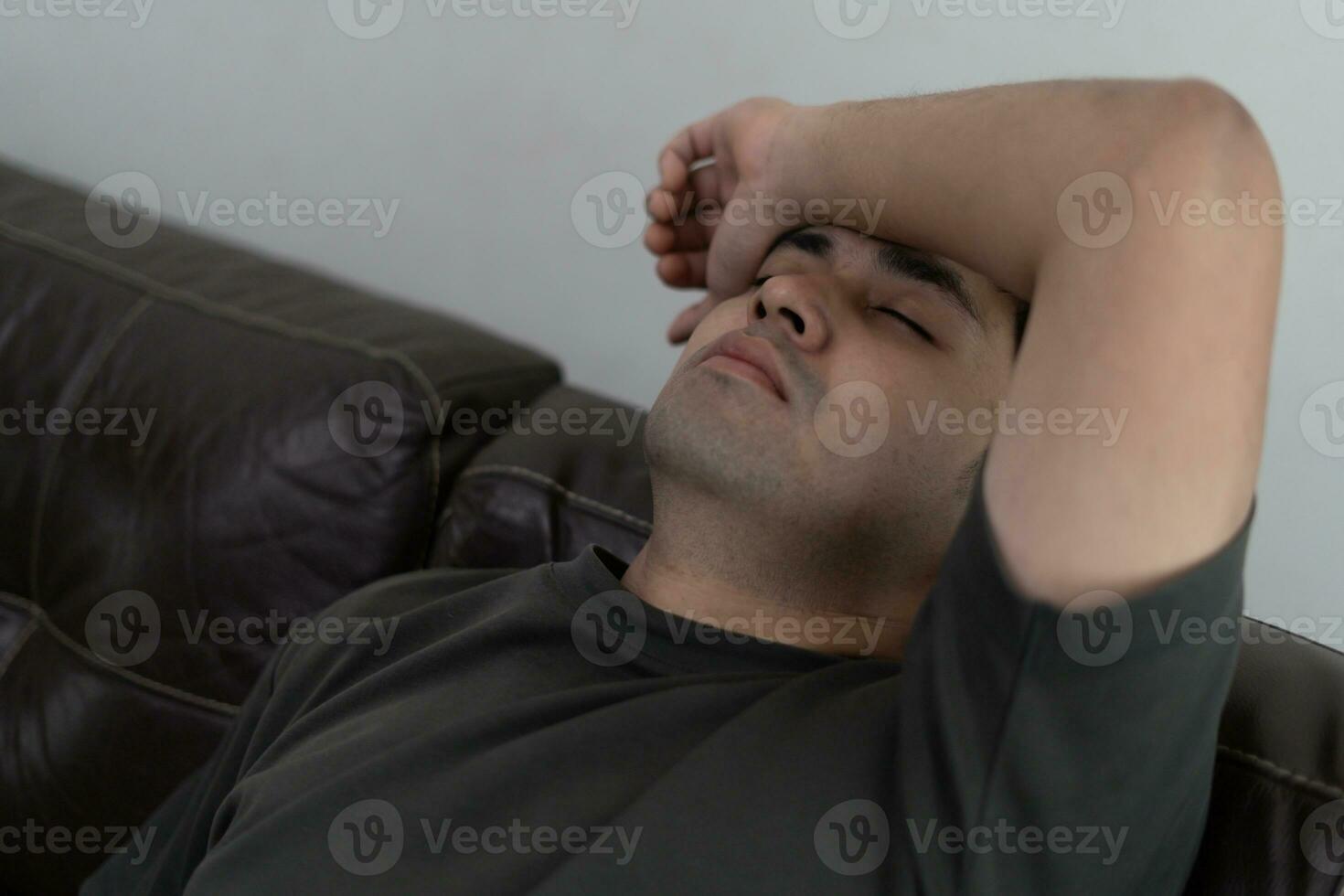 Depression and mental illness. Asian man disappoint, sad after receive bad news. Stressed boy confused with unhappy problem, arguing with girlfriend, cry and worry about unexpected work, down economy. photo