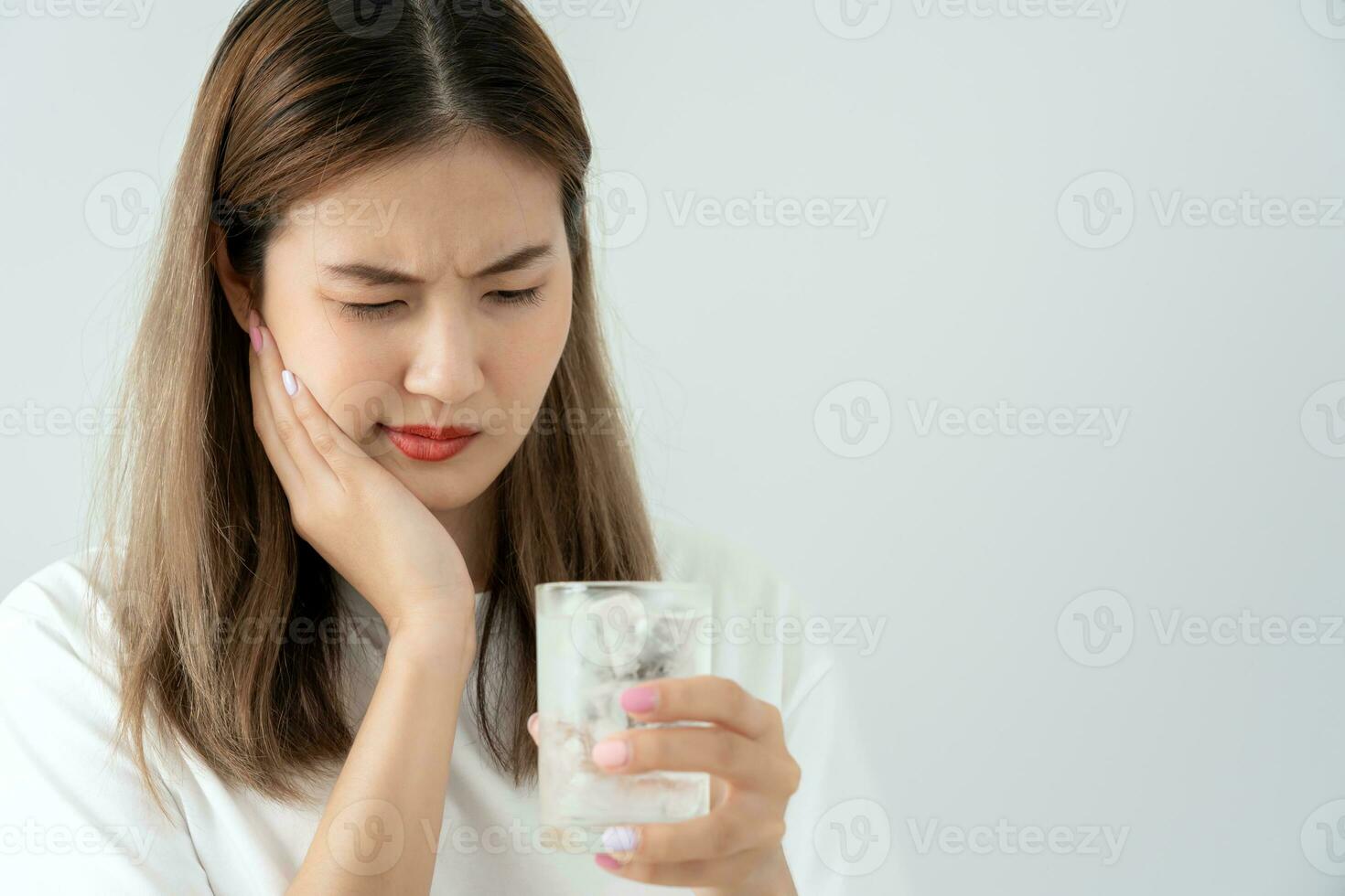 Asian woman feel sensitive teeth after drinking cold, female suffer tooth, decay problems, dental care, tooth extraction, decay problem, bad breath, Gingival Recession, Oral Hygiene instruction photo