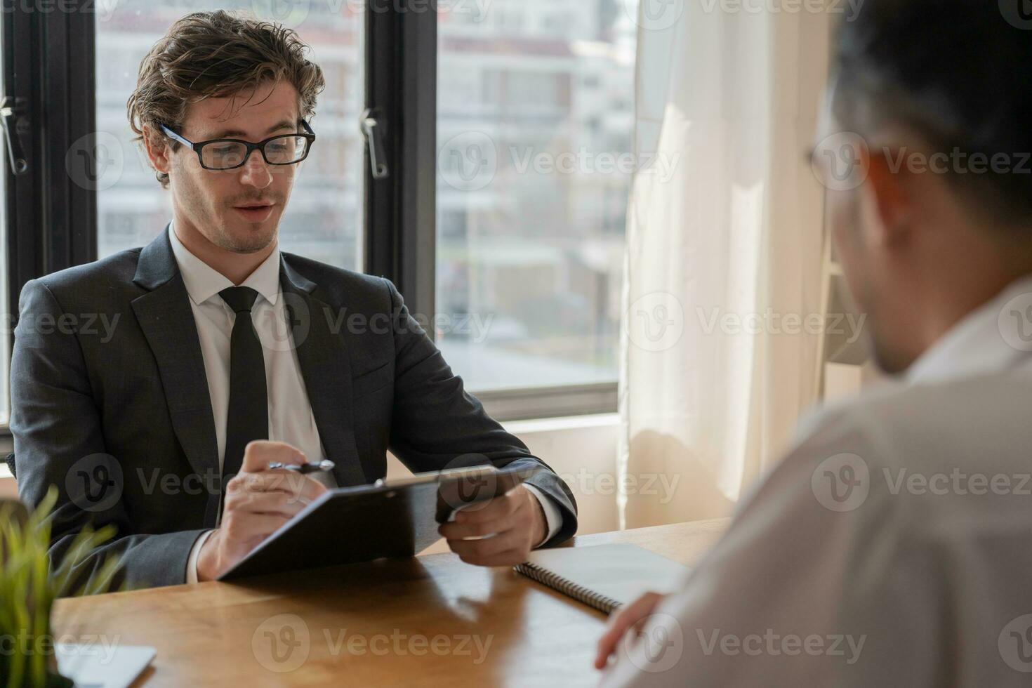 Executives accept job application documents and read job applicants resume to match the position. company publishes vacancies online to find human. Human resource, interview, letters, competence. photo