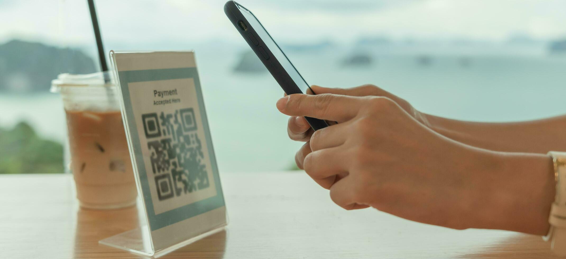 Modern woman use phone to scan barcode or QR codes to pay credit card bill after receive document invoice. payment, receive, paying electricity, digital payments without money, technology, scanning photo