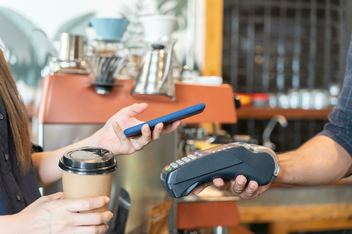 Woman use smartphone to scan QR code to pay in cafe restaurant with a digital payment without cash. Choose menu and order accumulate discount. E wallet, technology, pay online, credit card, bank app. photo