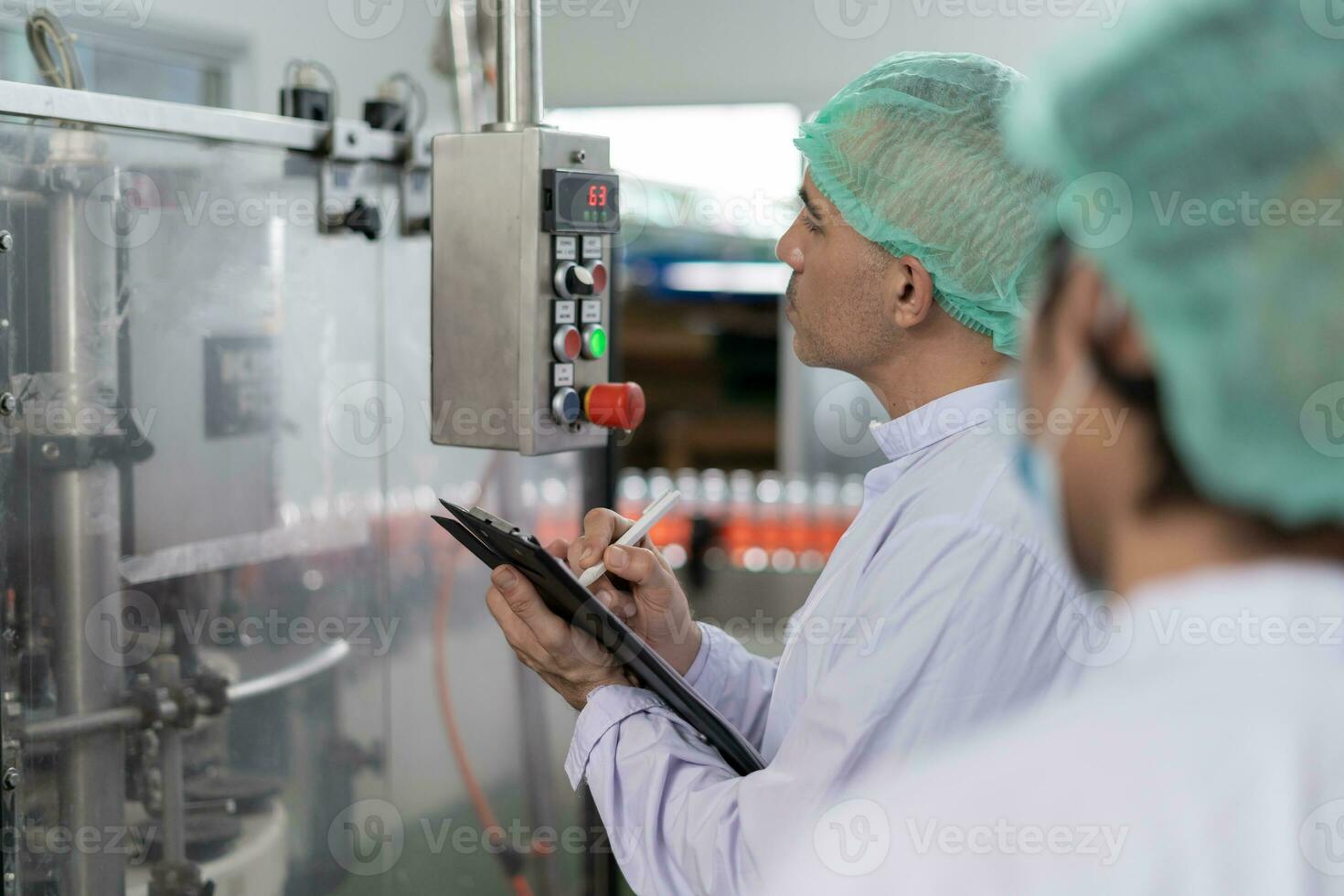 quality supervisor food or beverages technician inspection about quality control food or beverages before send product to the customer. Production leader recheck ingredient and productivity. photo