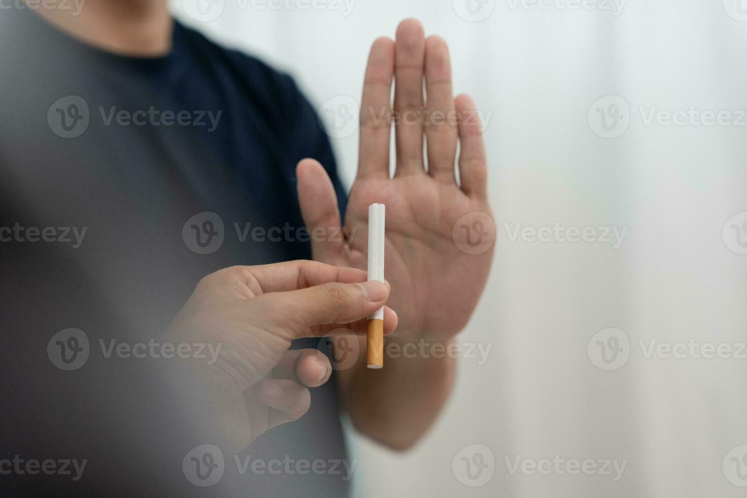 No smoking. Man stop smoke, refuse, reject, break take cigarette, say no. quit smoking for health. world tobacco day. drugs, Lung Cancer, emphysema , Pulmonary disease, narcotic, nicotine effect photo