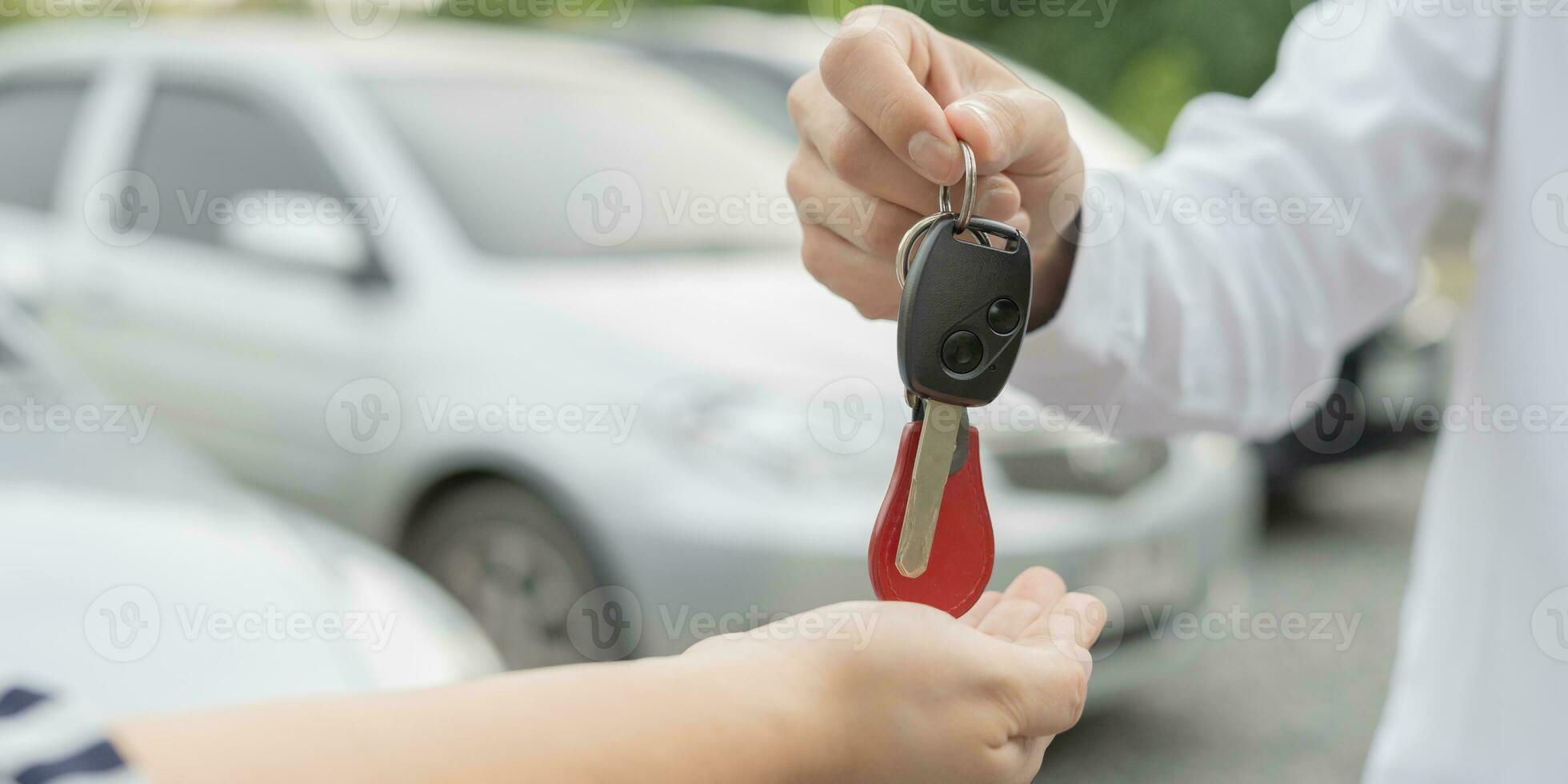 lease, rental car, sell, buy. Dealership manager send car keys to the new owner.  Sales, loan credit financial, rent vehicle, insurance,  renting, Seller, dealer, installment, car care business photo