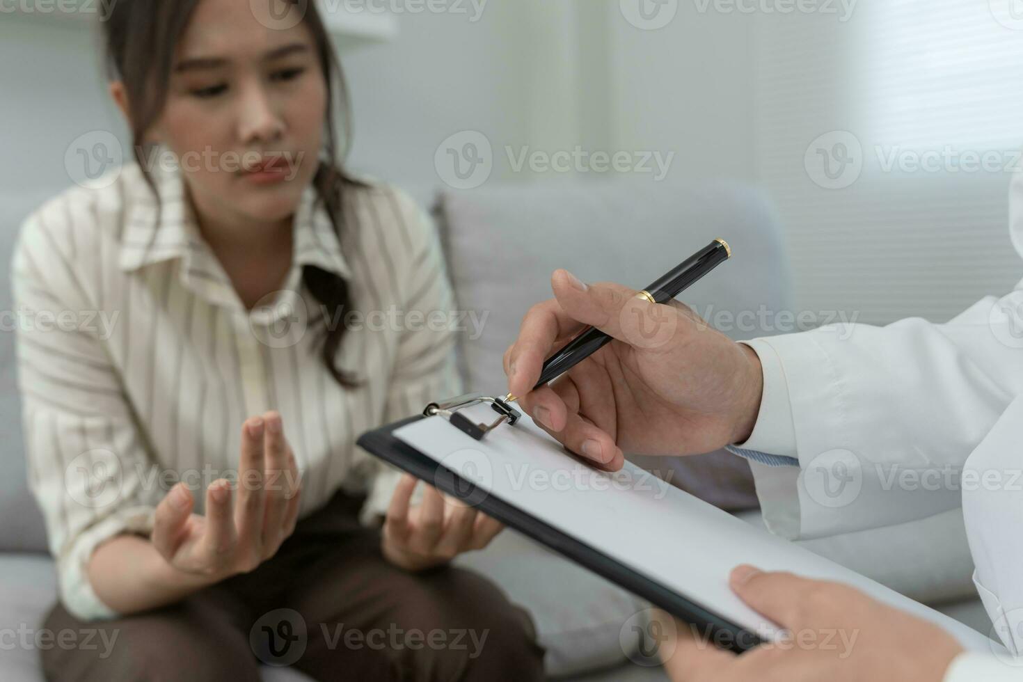 woman with mental health problems is consulting. psychiatrist is recording the patient's condition for treatment. encouragement, love and family problem, bipolar , depression patient, protect suicide photo