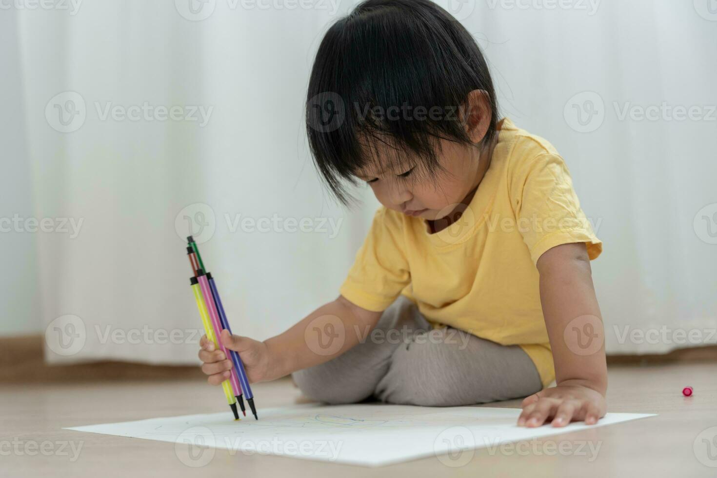 Happy Asia children playing learning paint on paper. Activity, development, IQ, EQ, meditation, brain, muscles, essential skills, family having fun spending time together. Holiday photo