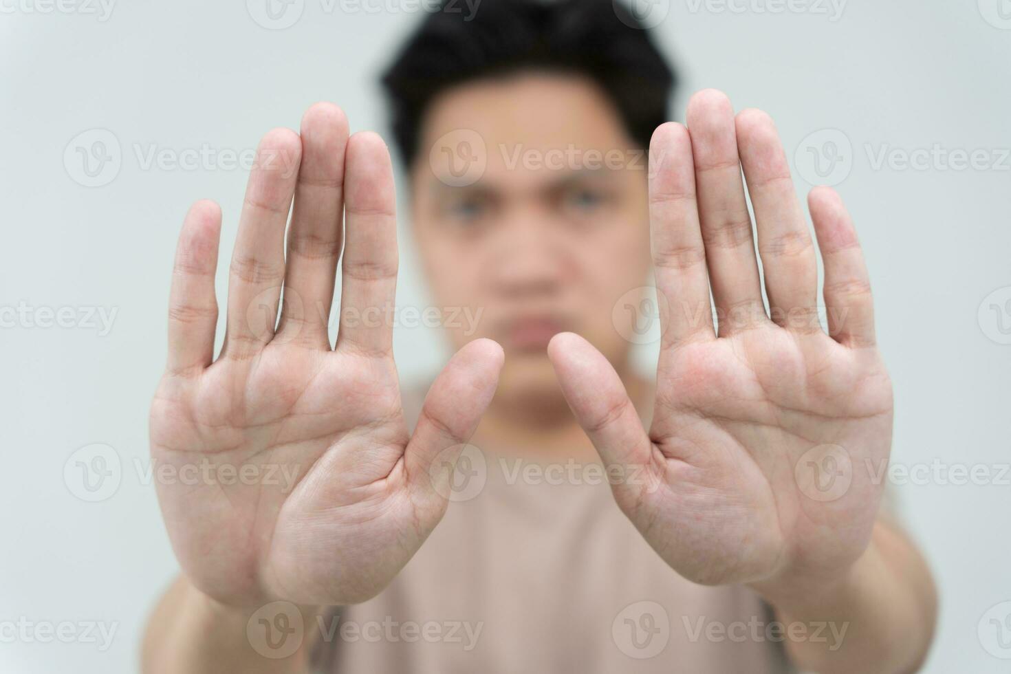 hand showing stop, insult. Pressure, sexism. Racism, stop violence expression with negative, stop taboo sign, rejecting, declining something, campaign against violence against. photo