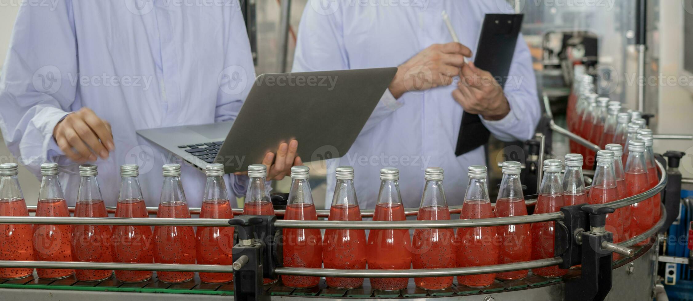 quality inspector food or beverages technician inspection about quality control food or beverages before send product to the customer. Production leader recheck ingredient and productivity. photo