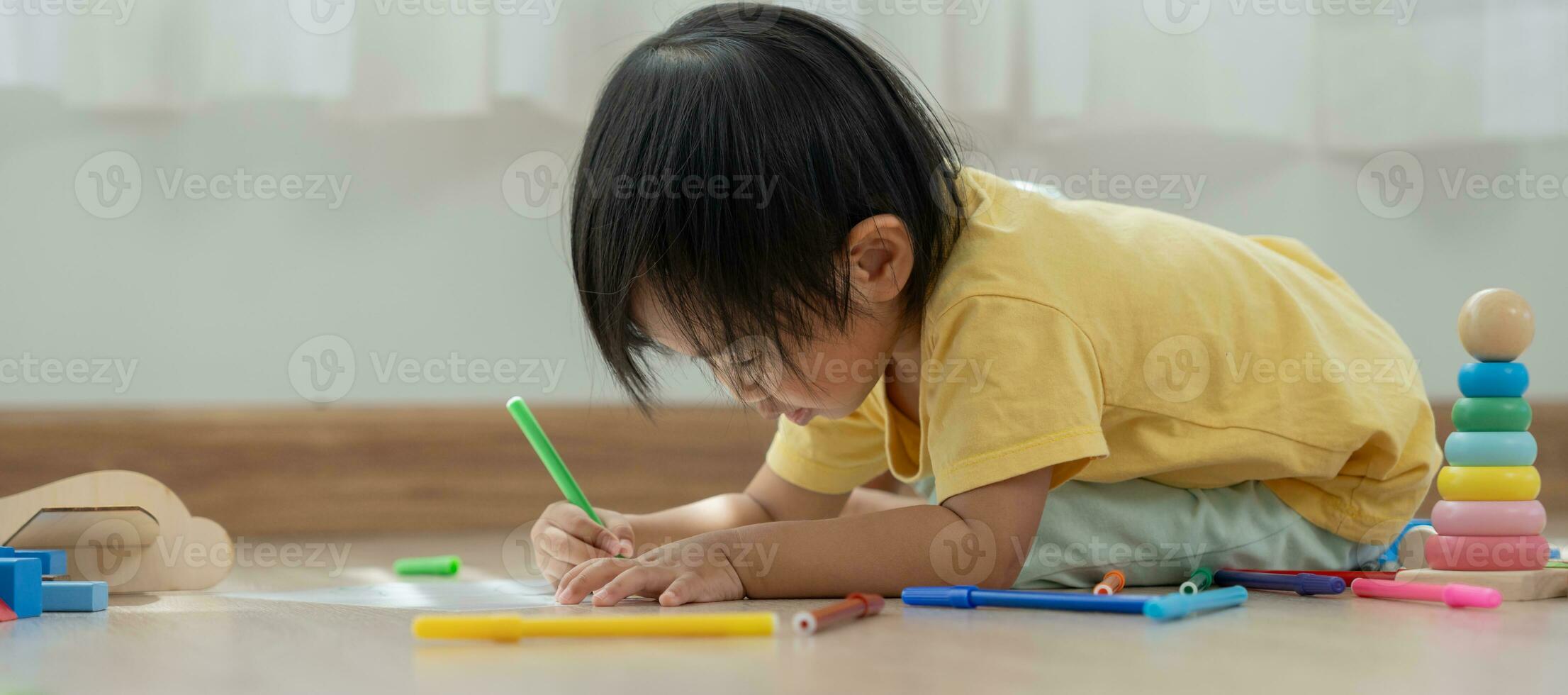 Happy Asia children playing learning paint on paper. Activity, development, IQ, EQ, meditation, brain, muscles, essential skills, family having fun spending time together. Holiday photo