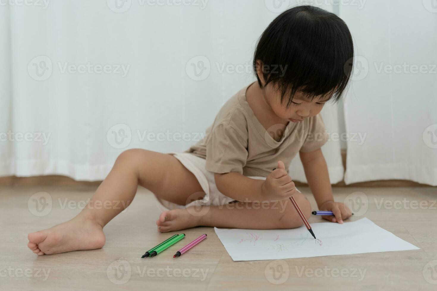 Happy Asia children playing learning paint on paper. Activity, development, IQ, EQ, meditation, brain, muscles, essential skills, family having fun spending time together. Holiday photo