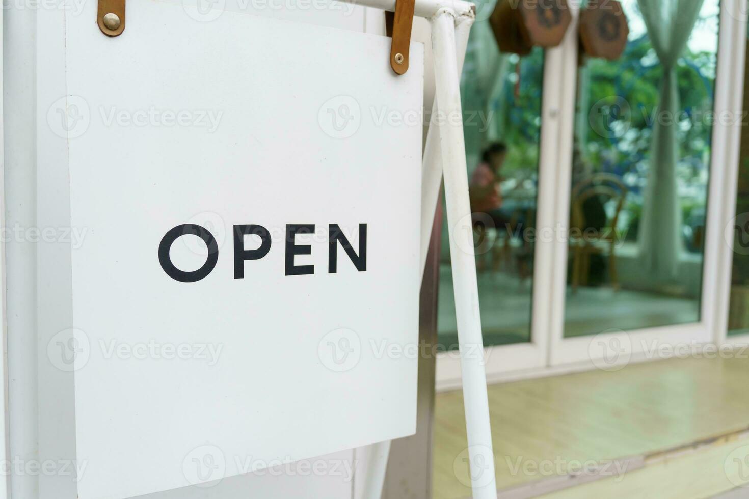 Open sign board. Board or start of opening Welcome entrance of Small business cafe or restaurant and advertising with open sign photo