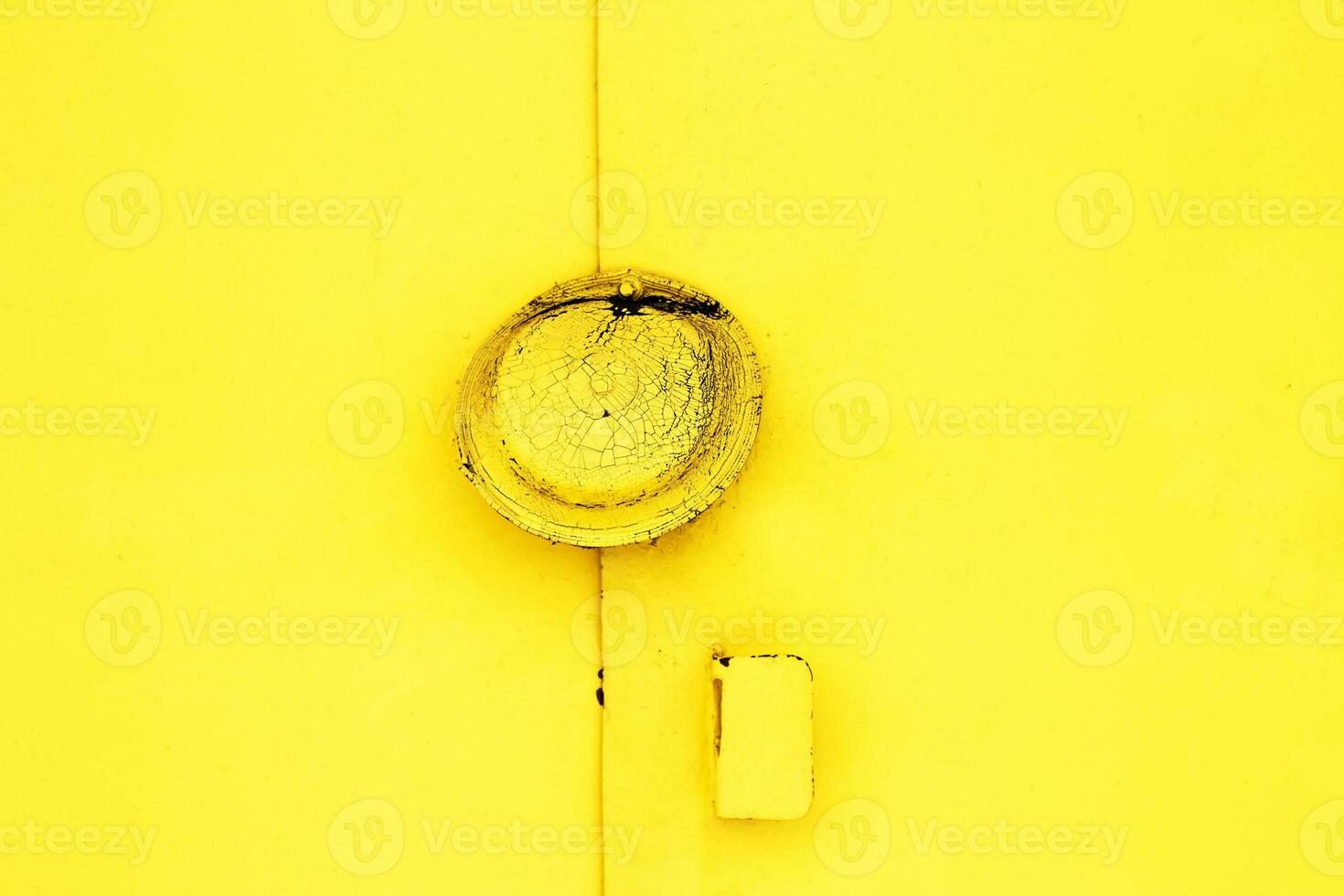 metal yellow doors with a lock abstract background. Monocolor texture pattern with copy space photo