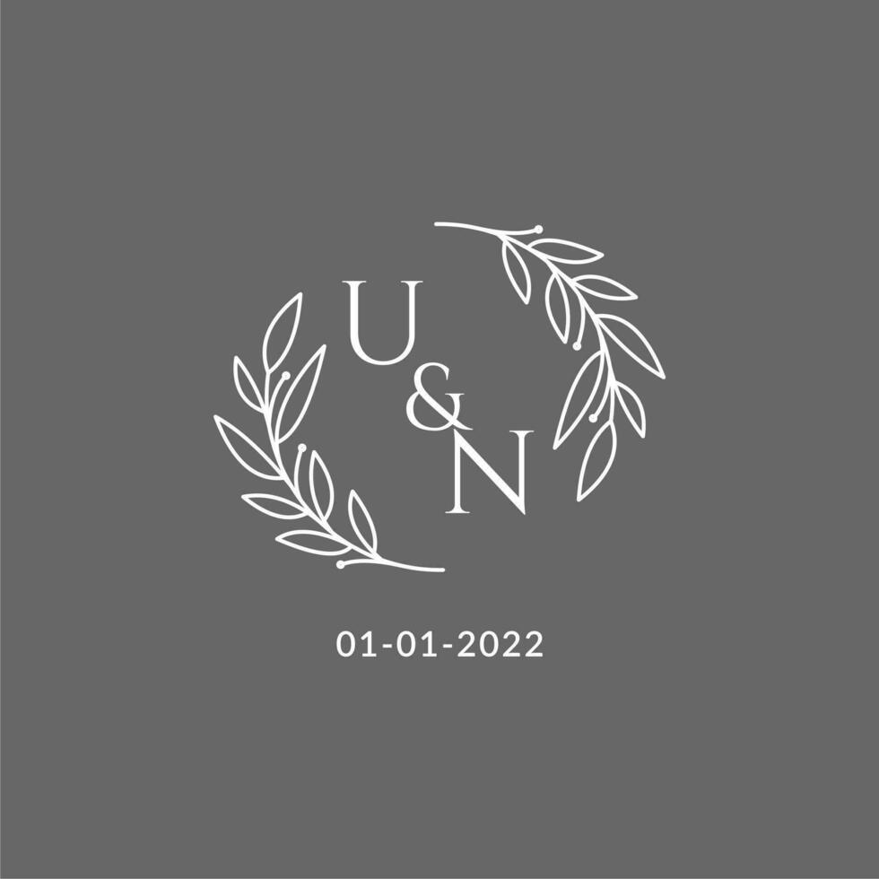 Initial letter UN monogram wedding logo with creative leaves decoration vector